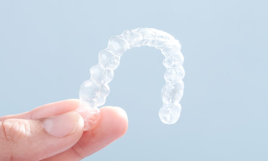 A close up image of an Invisalign tray.